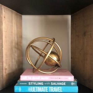 Gold tone metal orb home decor accent